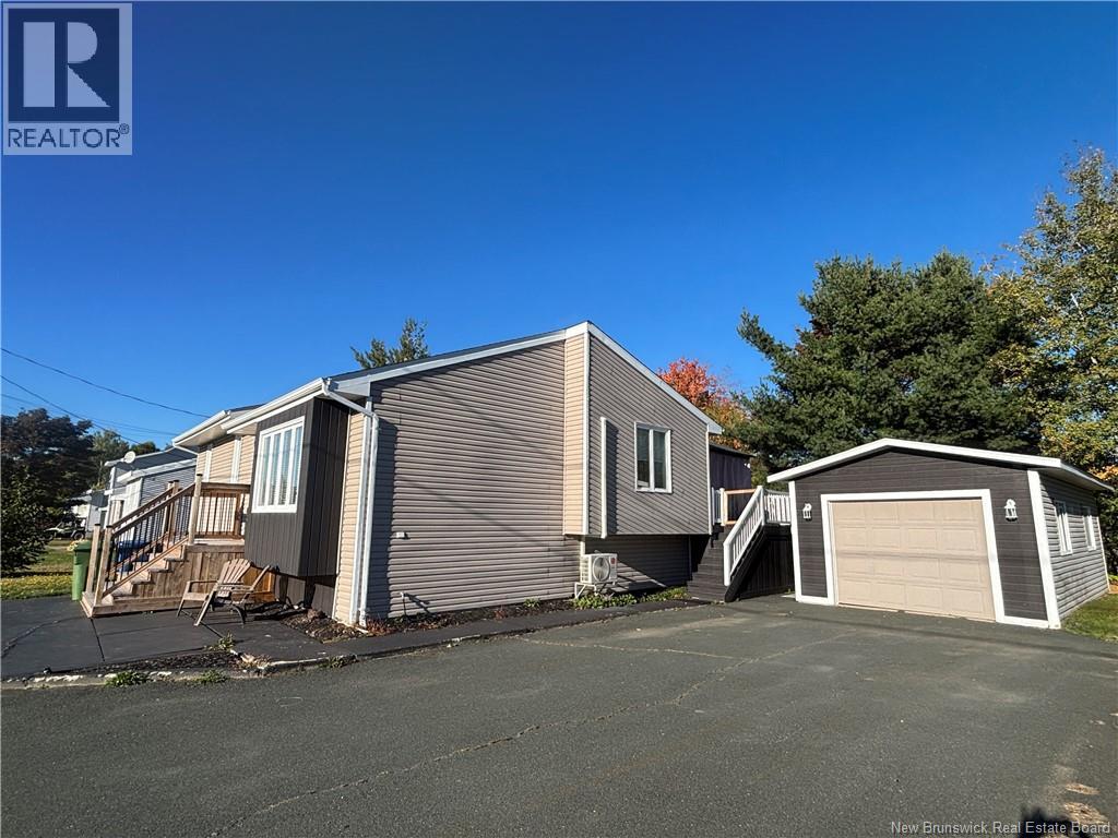 1027 Rue Hache, Beresford, New Brunswick E8K 1H9 - Photo 2 - NB128277