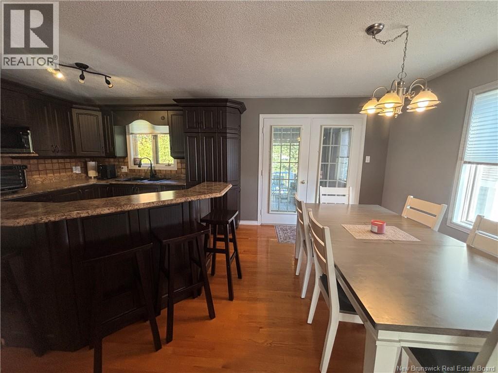 1027 Rue Hache, Beresford, New Brunswick E8K 1H9 - Photo 26 - NB128277