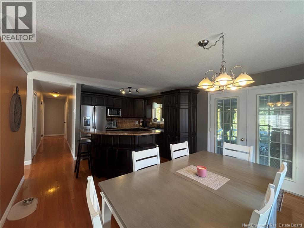 1027 Rue Hache, Beresford, New Brunswick E8K 1H9 - Photo 27 - NB128277