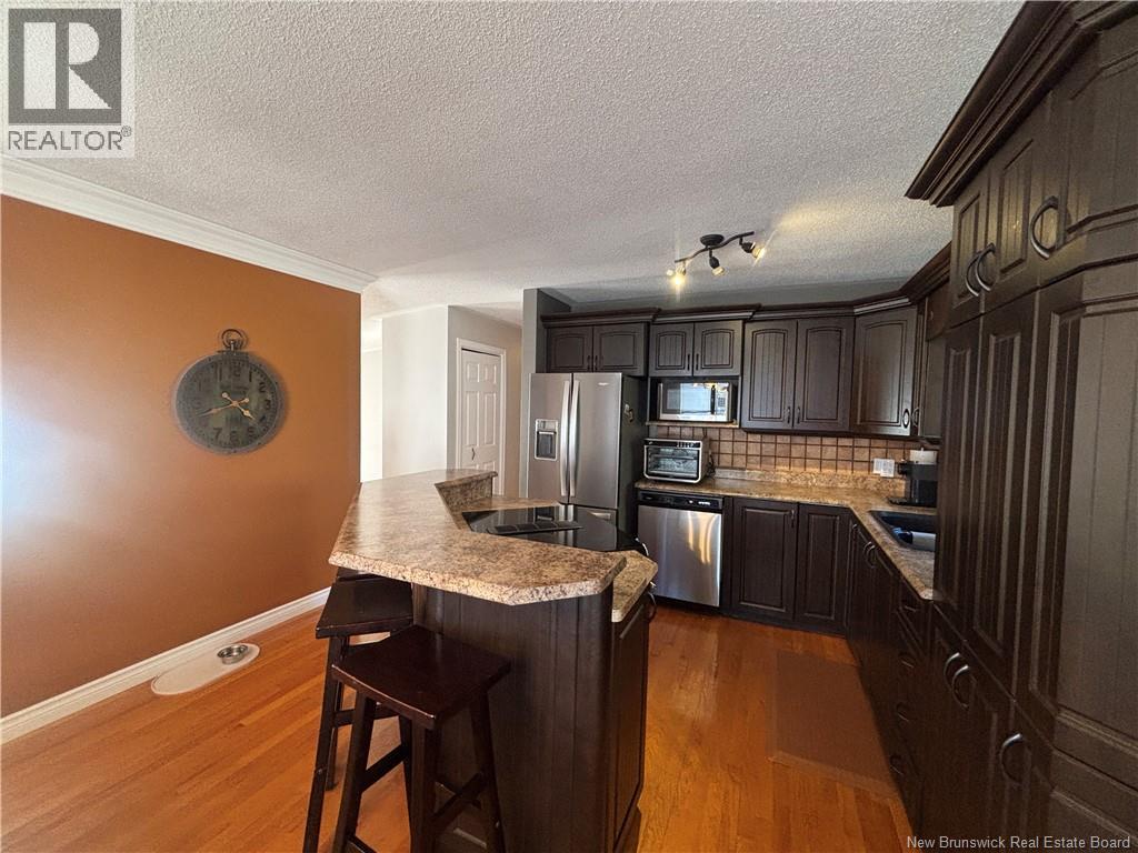 1027 Rue Hache, Beresford, New Brunswick E8K 1H9 - Photo 31 - NB128277