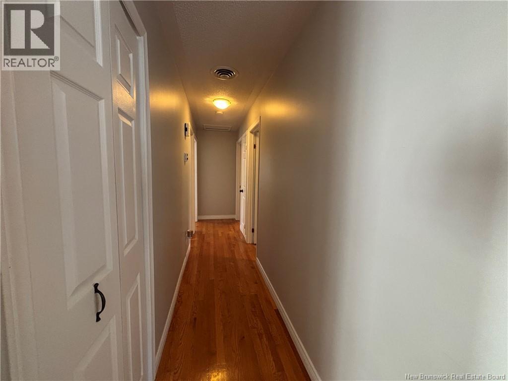 1027 Rue Hache, Beresford, New Brunswick E8K 1H9 - Photo 32 - NB128277