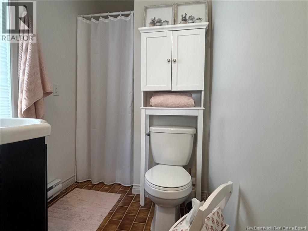 1027 Rue Hache, Beresford, New Brunswick E8K 1H9 - Photo 36 - NB128277