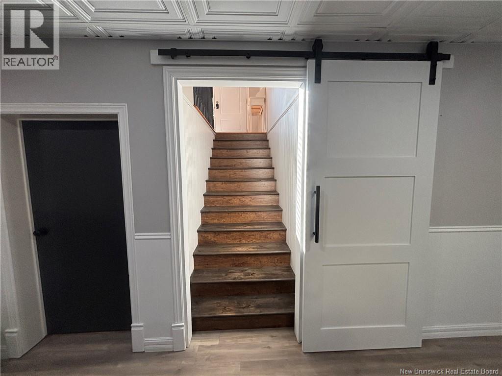 1027 Rue Hache, Beresford, New Brunswick E8K 1H9 - Photo 40 - NB128277