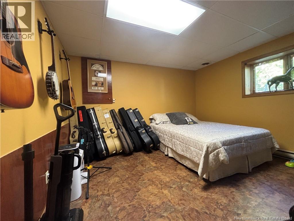 1027 Rue Hache, Beresford, New Brunswick E8K 1H9 - Photo 47 - NB128277