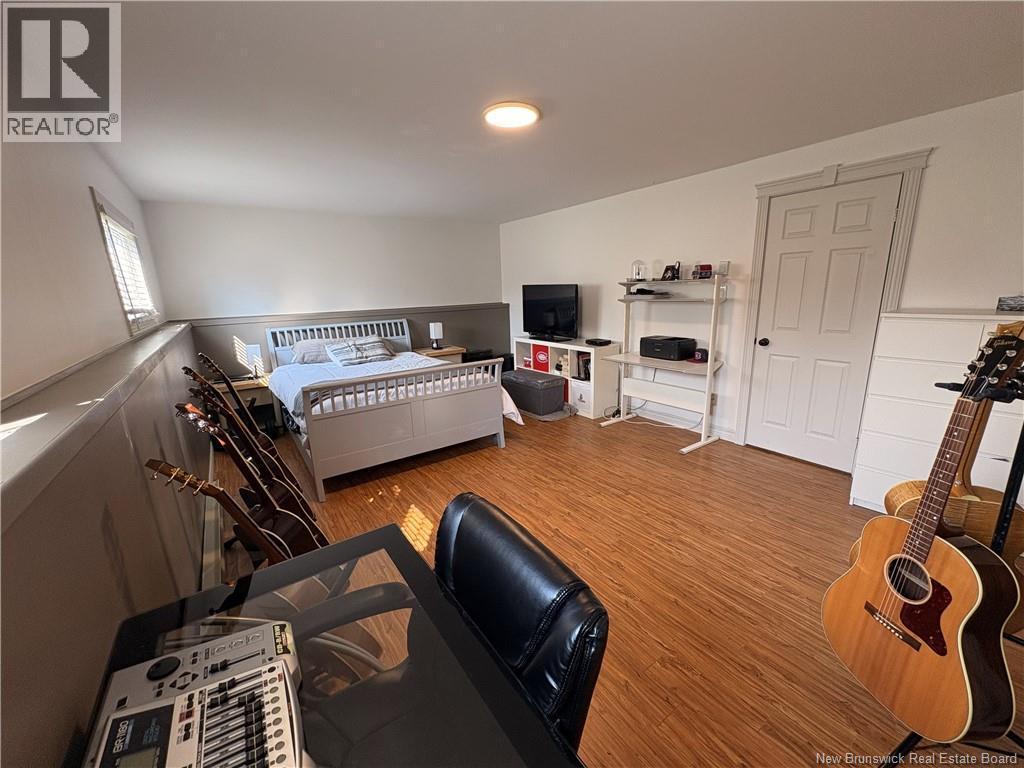 1027 Rue Hache, Beresford, New Brunswick E8K 1H9 - Photo 49 - NB128277