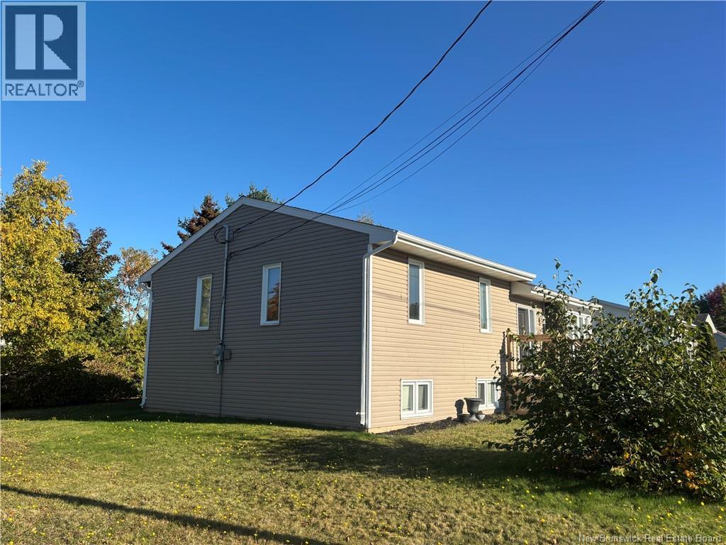 1027 Rue Hache, Beresford, New Brunswick E8K 1H9 - Photo 5 - NB128277