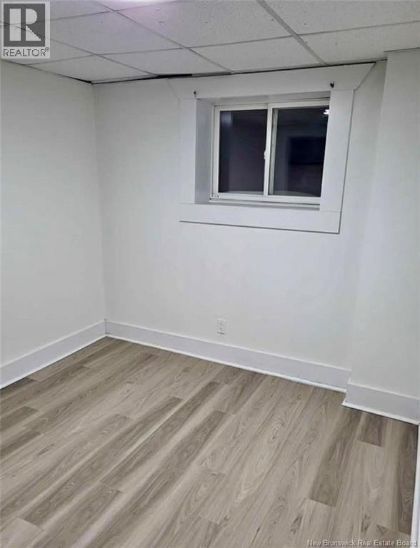 292 Parc Ouest Street, Beresford, New Brunswick  E8K 2E8 - Photo 19 - NB133125