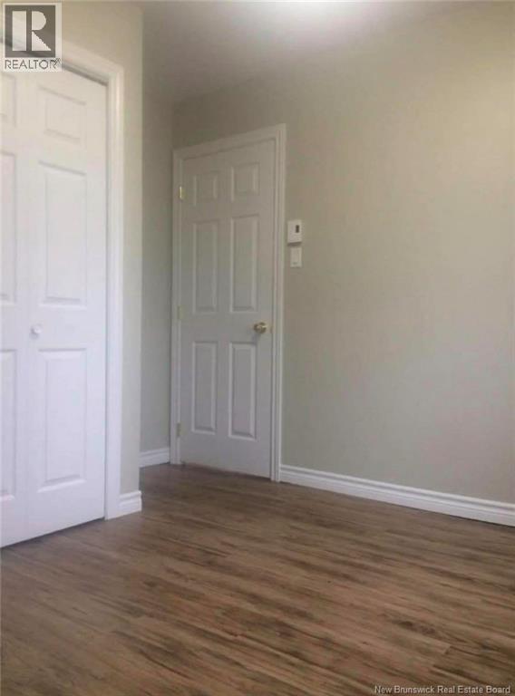 292 Parc Ouest Street, Beresford, New Brunswick  E8K 2E8 - Photo 6 - NB133125