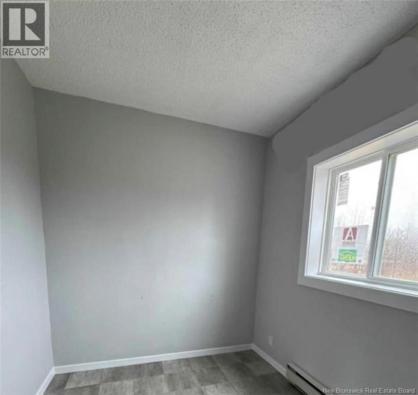 292 Parc Ouest Street, Beresford, New Brunswick  E8K 2E8 - Photo 7 - NB133125