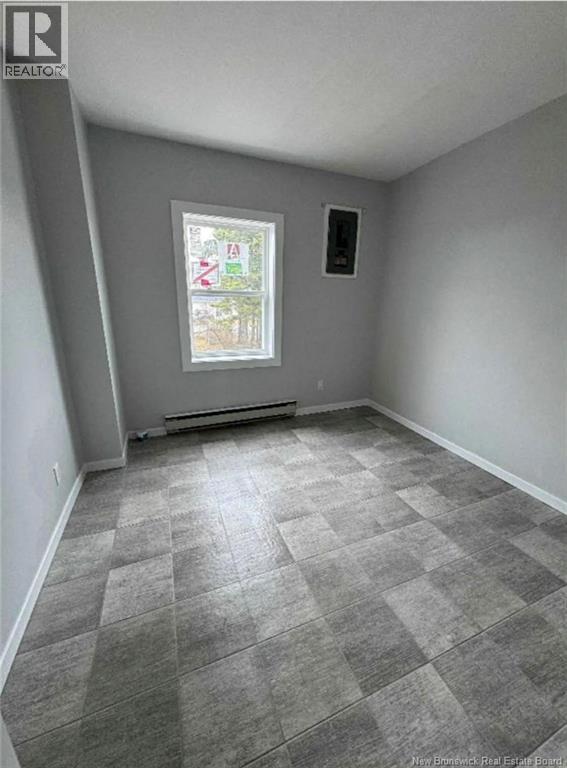 292 Parc Ouest Street, Beresford, New Brunswick  E8K 2E8 - Photo 9 - NB133125