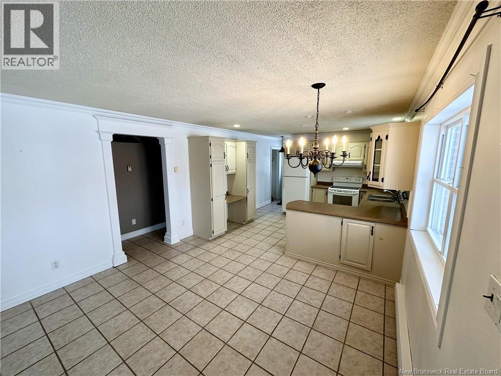 11 Francois Street, Charlo, New Brunswick  E8E 2J8 - Photo 3 - NB133433