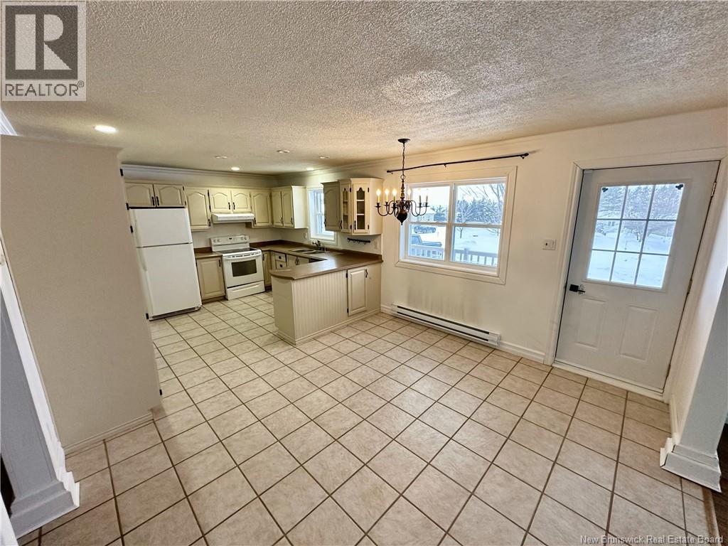 11 Francois Street, Charlo, New Brunswick  E8E 2J8 - Photo 4 - NB133433