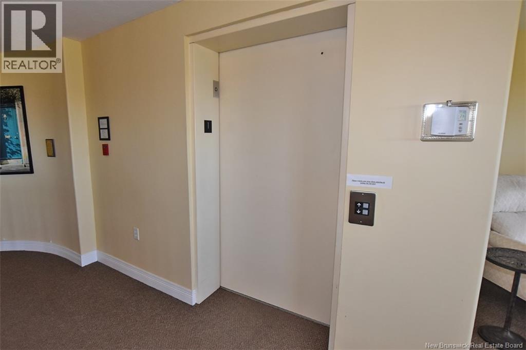 1 Golf Greens Lane Unit# 412, Fredericton, New Brunswick  E3B 9T9 - Photo 35 - NB139585