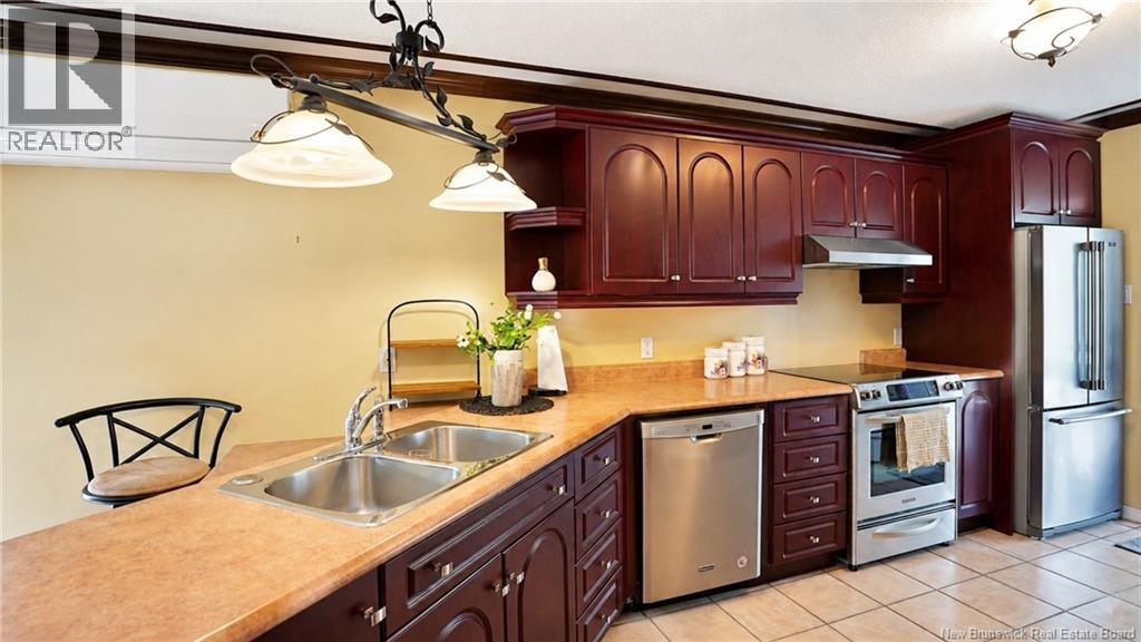 485 Rue Msgr Richard, Beresford, New Brunswick  E8K 1Y9 - Photo 12 - NB143344