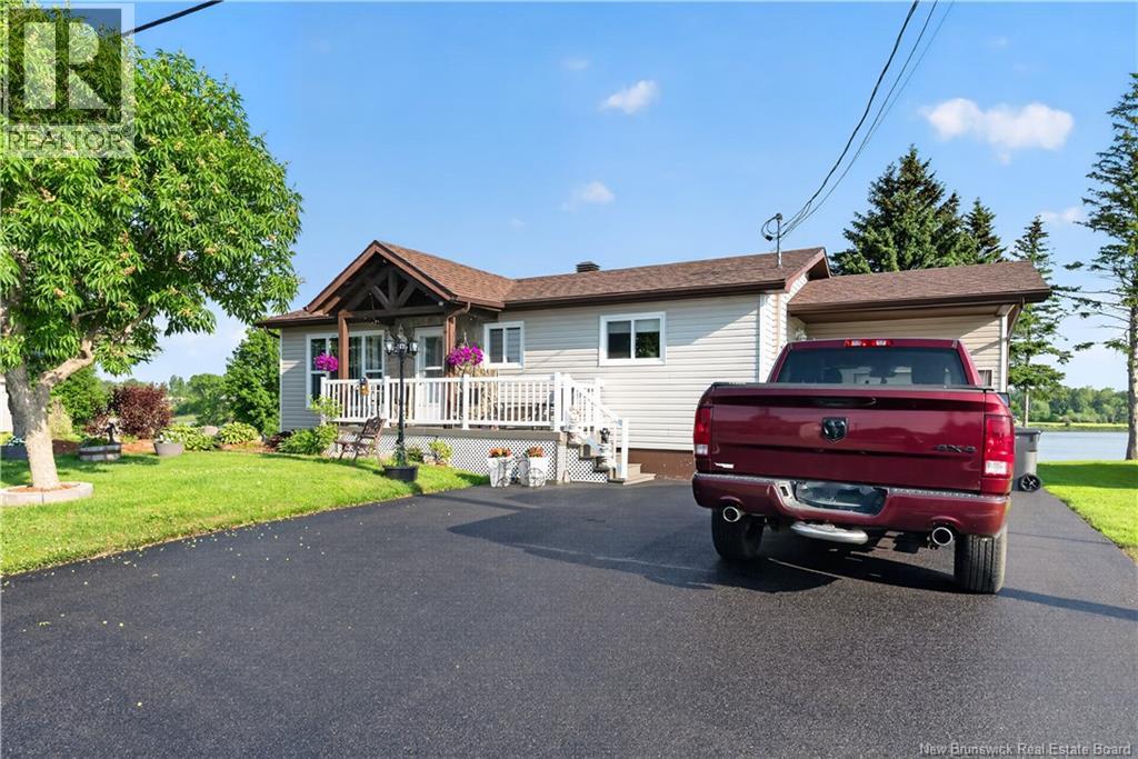 202 Rue Marie, Beresford, New Brunswick  E8K 1P8 - Photo 1 - NB143611