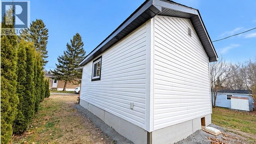 229 Poplar, Beresford, New Brunswick  E8K 1E5 - Photo 3 - NB150371