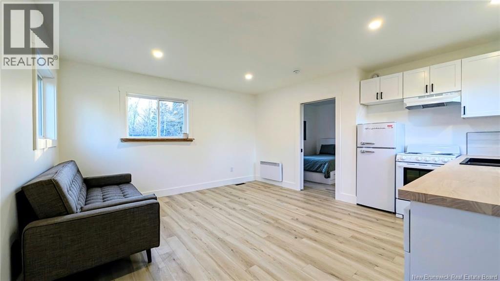 229 Poplar, Beresford, New Brunswick  E8K 1E5 - Photo 4 - NB150371