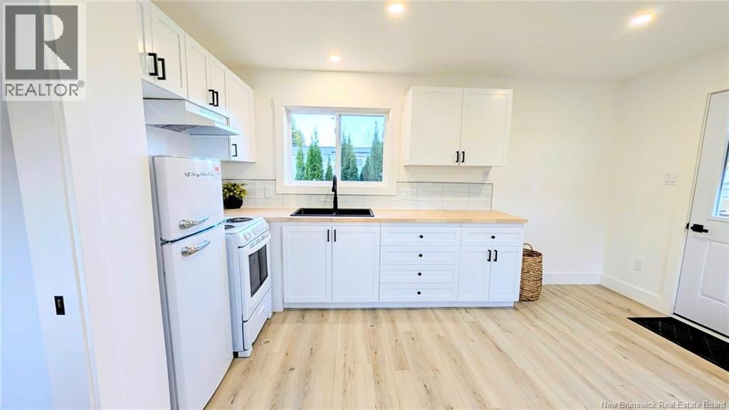 229 Poplar, Beresford, New Brunswick  E8K 1E5 - Photo 6 - NB150371