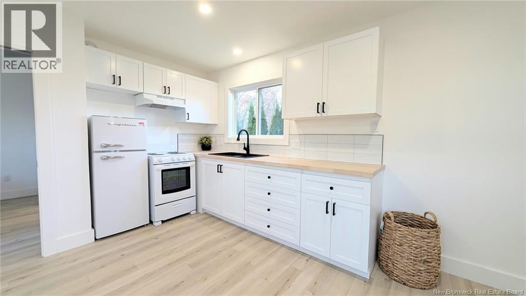 229 Poplar, Beresford, New Brunswick  E8K 1E5 - Photo 7 - NB150371